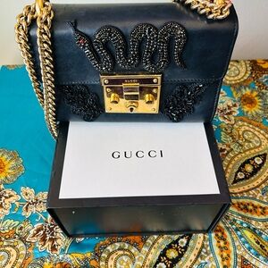 Gucci Black Leather Bag with Gold Accents